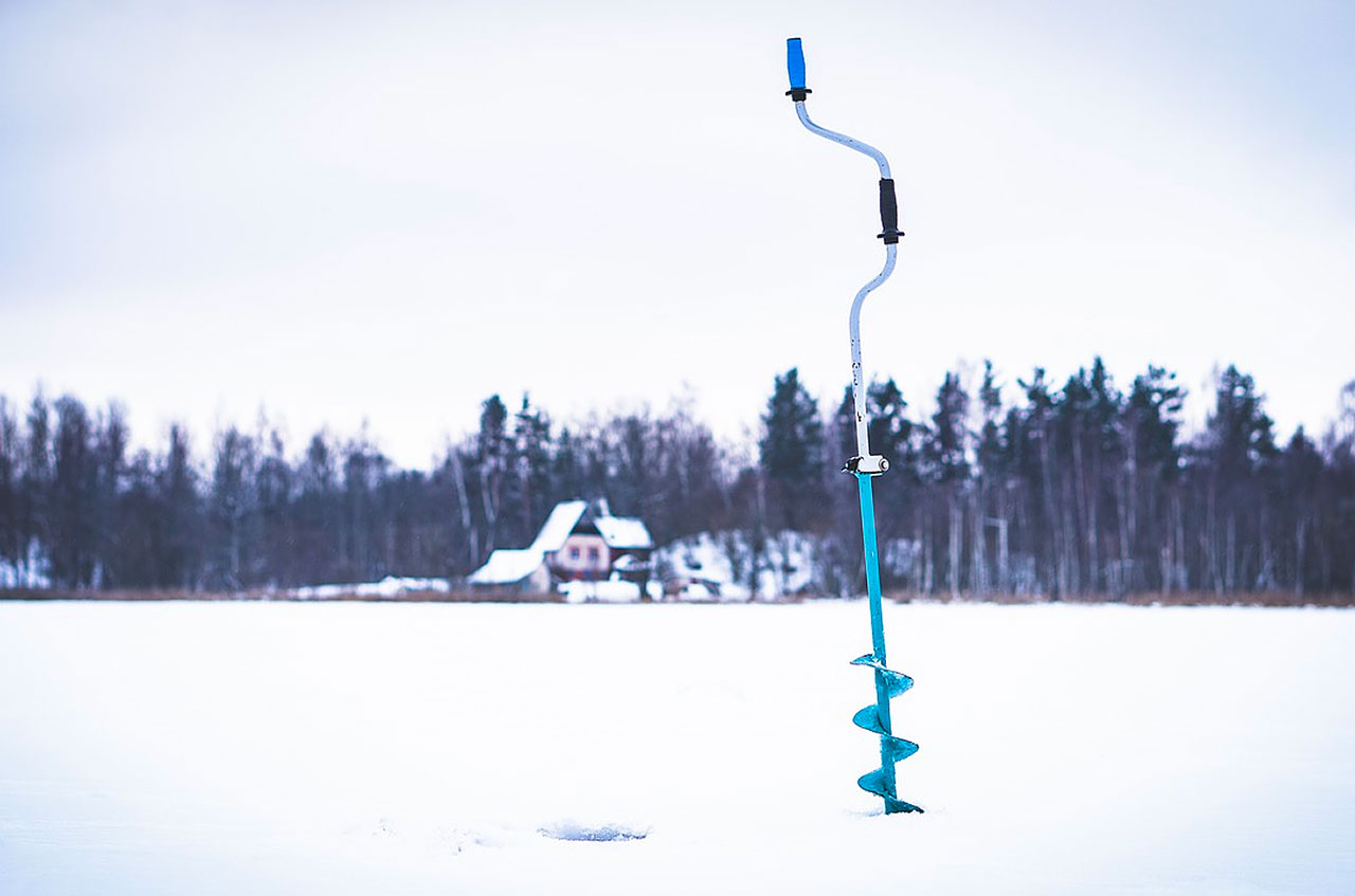 a turquoise ice auger