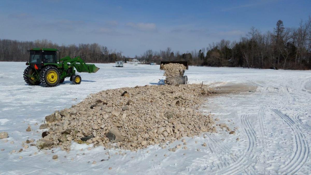 Building a walleye spawning reef. 3/2015.      